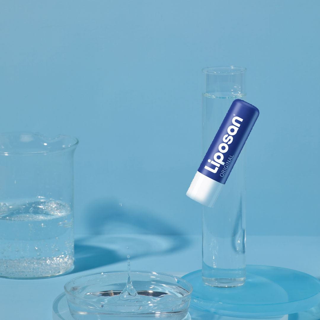 woman-applying-lip-balm