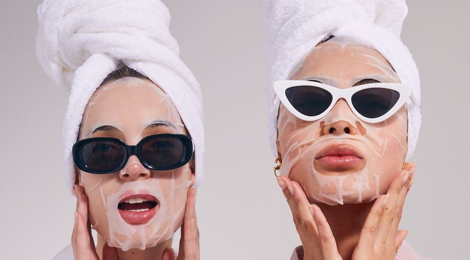 two girls with sunglasses on and Nivea beauty masks