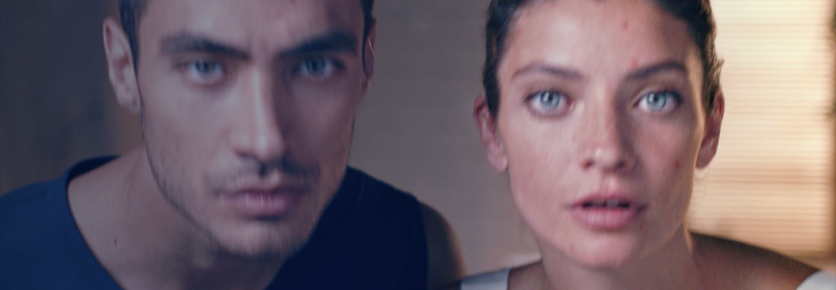 Close-up of a smiling man and woman with the text “Work with your skin, not against it,” promoting the NIVEA Derma Skin Clear 7‑day AM & PM routine.