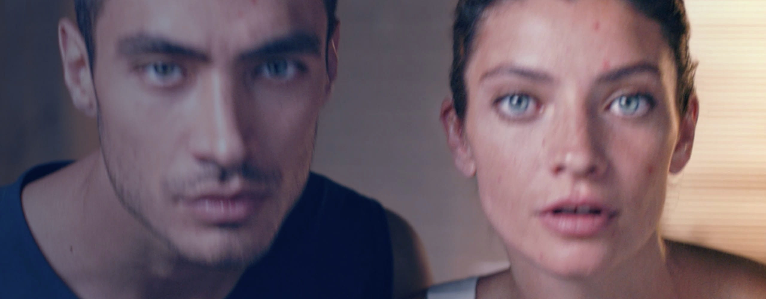 Close-up of a smiling man and woman with the text “Work with your skin, not against it,” promoting the NIVEA Derma Skin Clear 7‑day AM & PM routine.