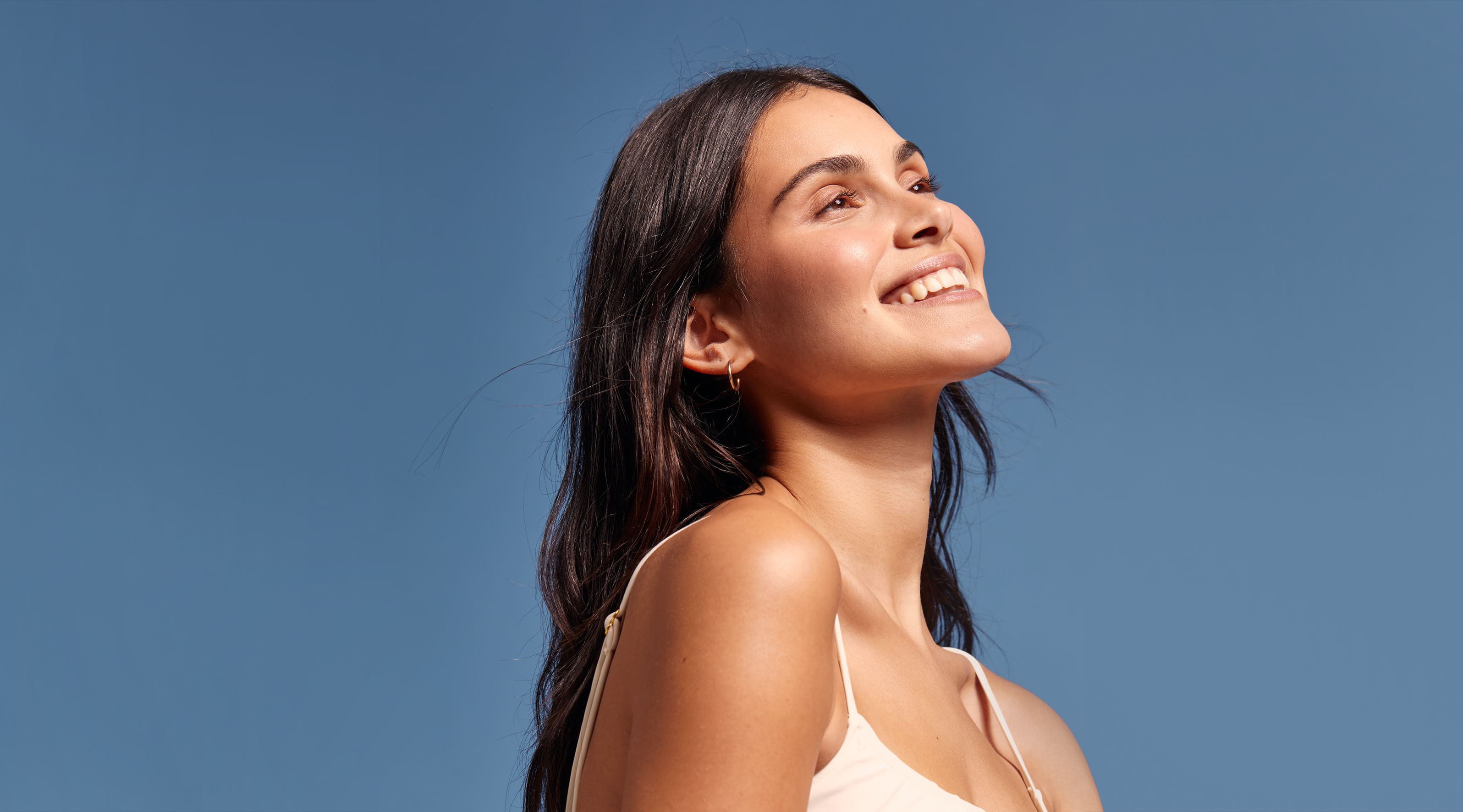 woman smiling in the sunshine