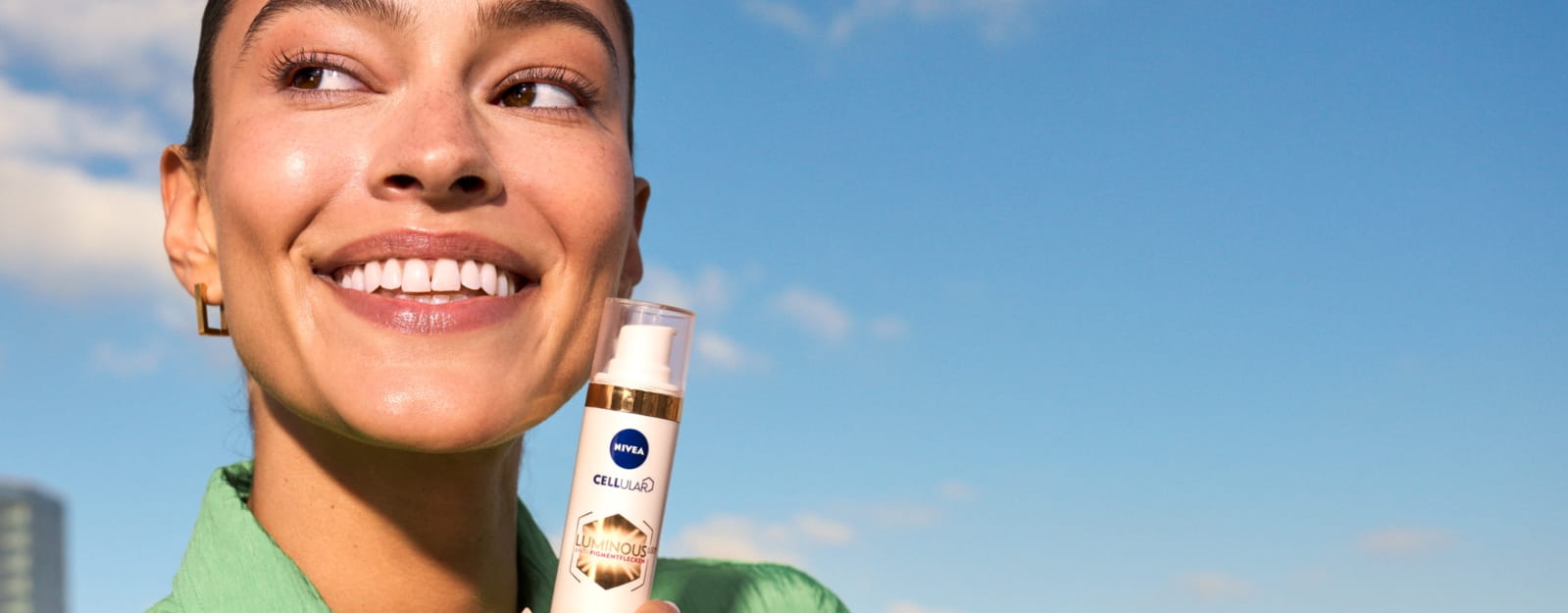 Woman posing with NIVEA's new LUMINOUS630® 3-in-1 CC Fluid