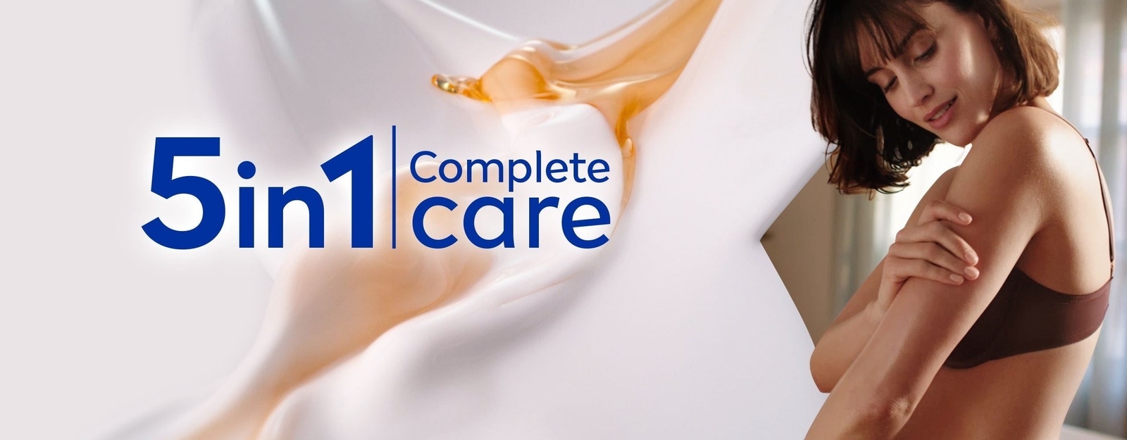 Women is using body milk for her dry skin as a skincare routine.