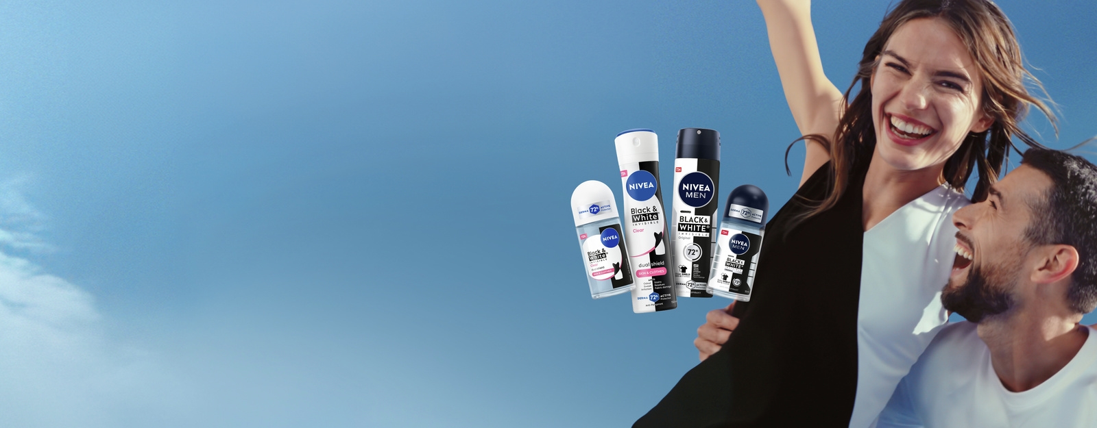 Smiling man and woman enjoying together next to a display of different deodorants