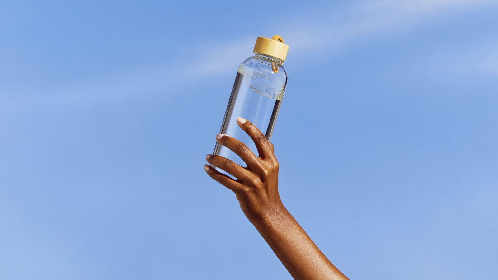 woman maintaining dewy skin