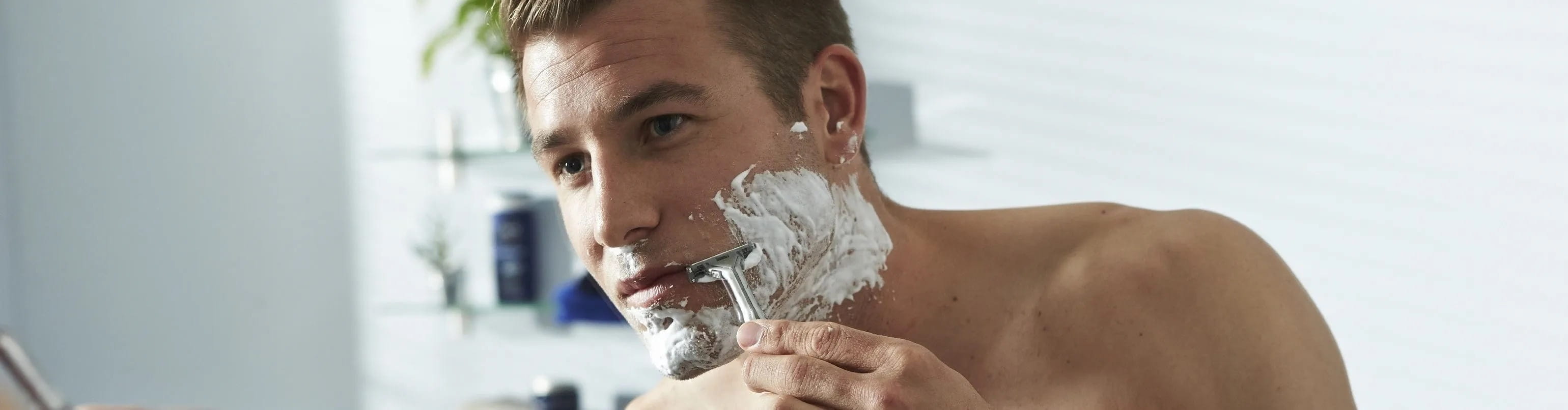 Shaving the male intimate area