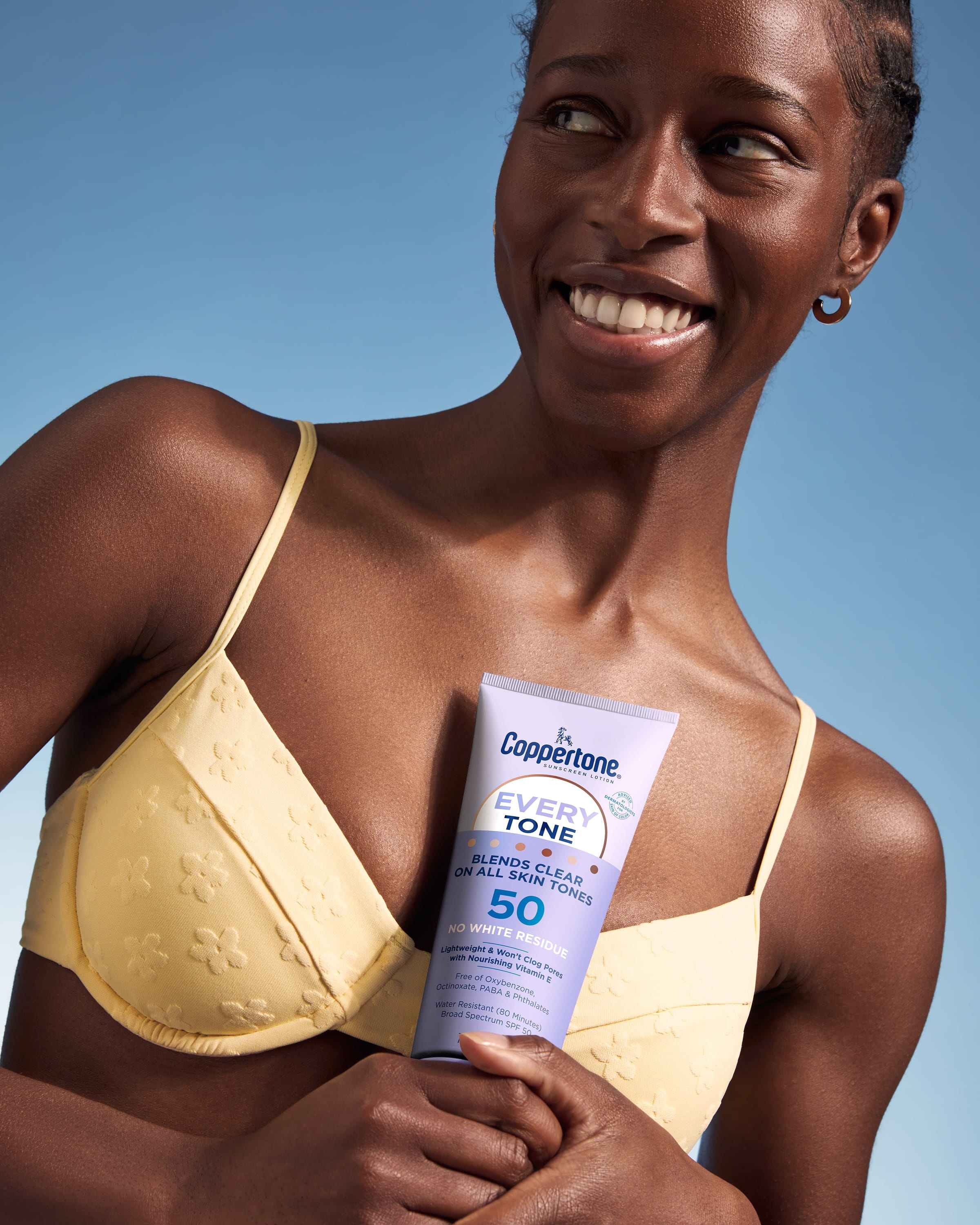 Woman with Coppertone Sunscreen