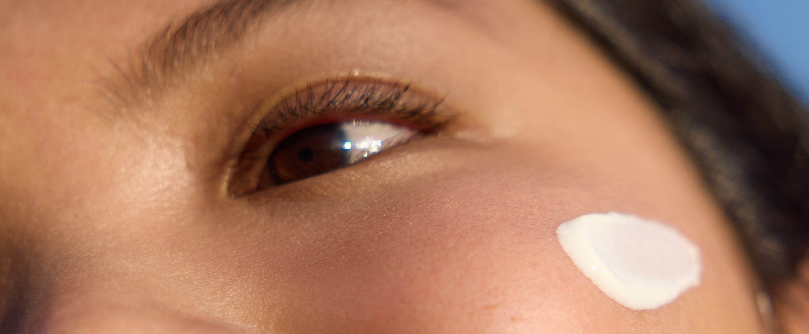 woman using Nivea Cellular Luminous 630 Anti-Dark Circles Treatment