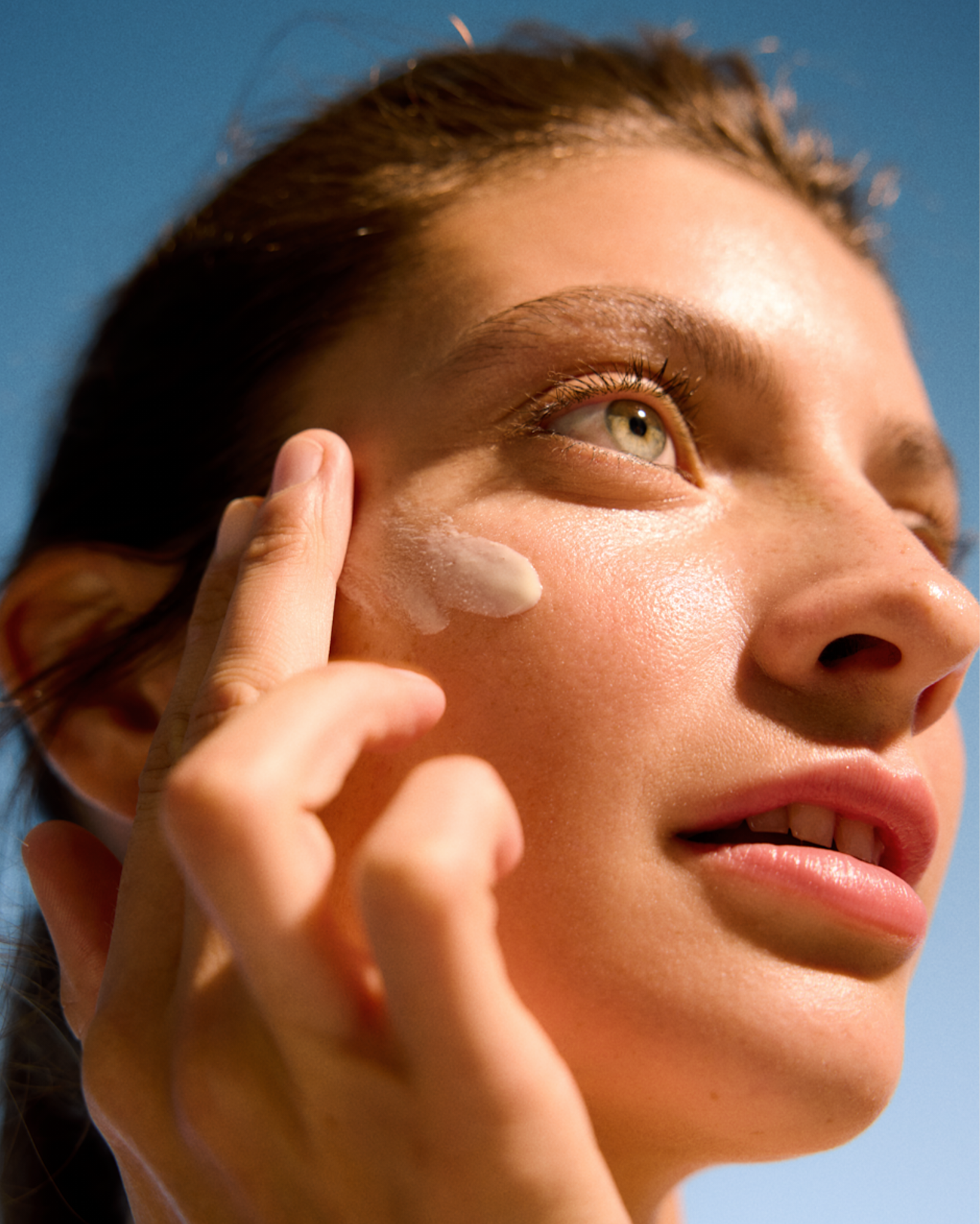 woman using vegan skincare product