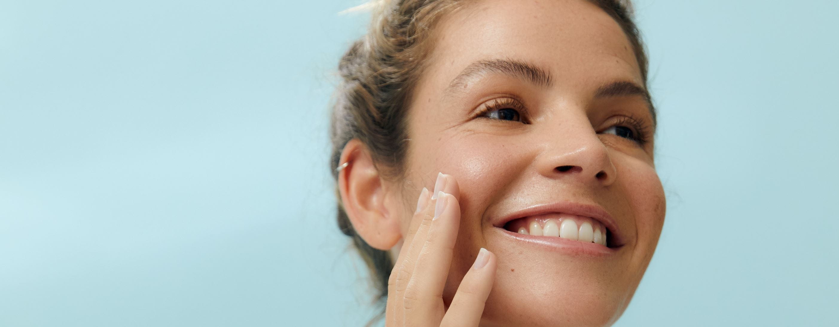 woman using micellar water