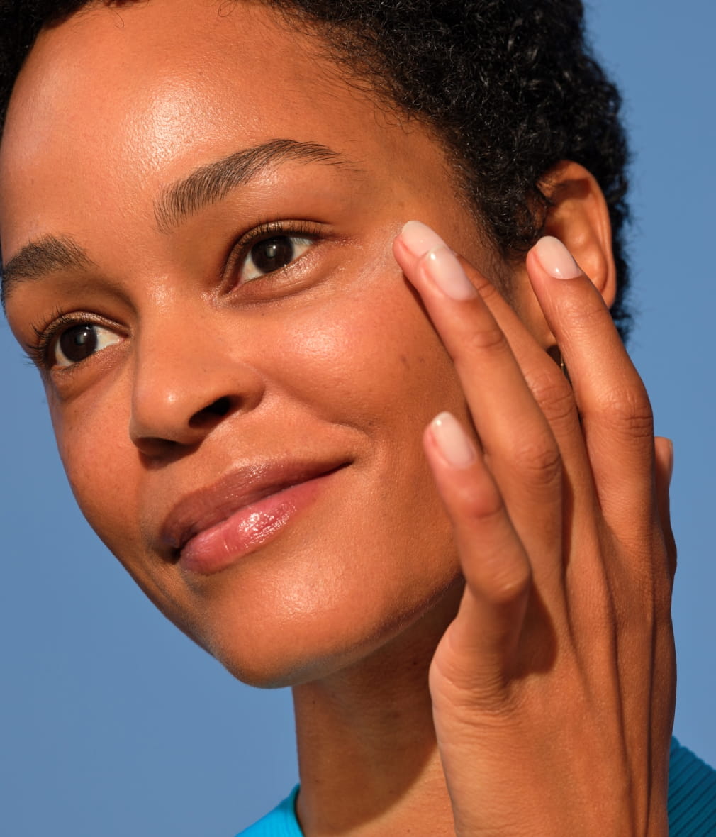 woman applying NIVEA Q10 power anti-wrinkle cream