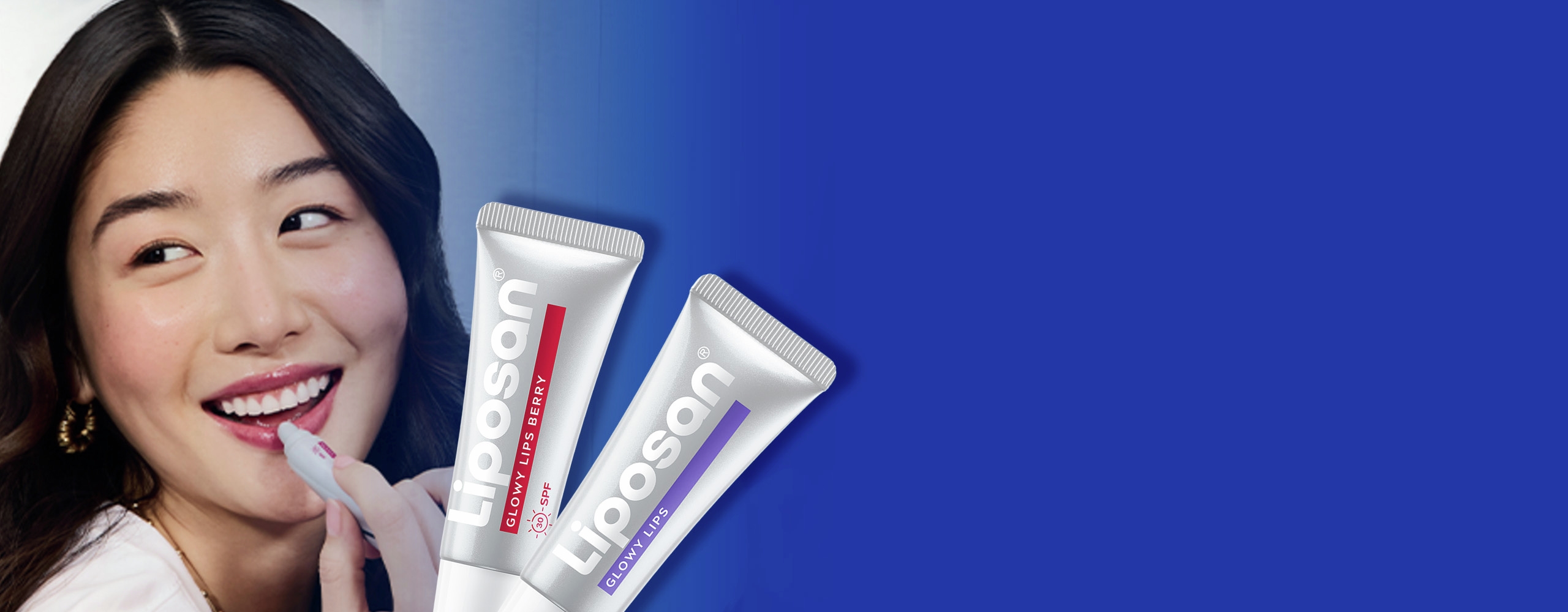 Γυναίκα με Liposan στα χείλη