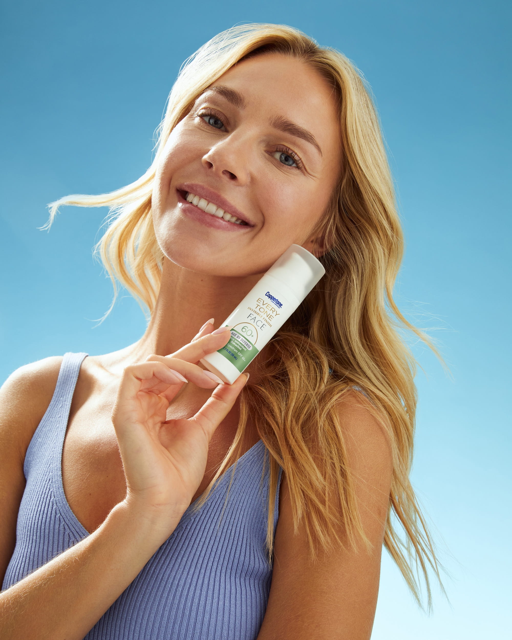 woman with coppertone sunscreen