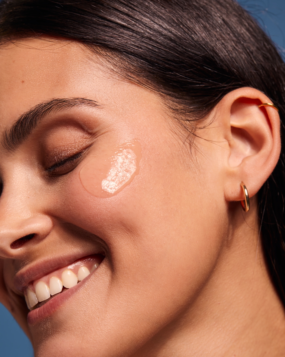 smiling women with sunscreen on her face