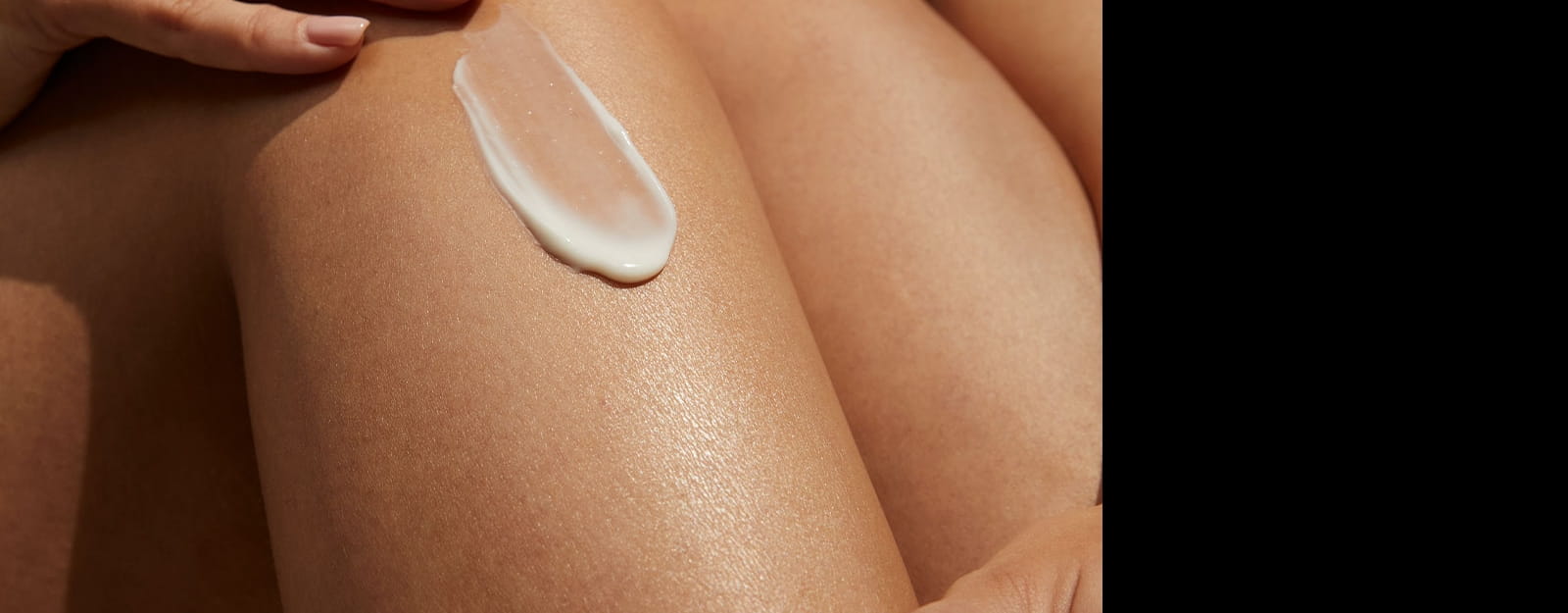 woman applying argan oil