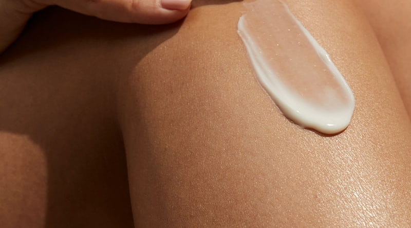 woman with her arms raised