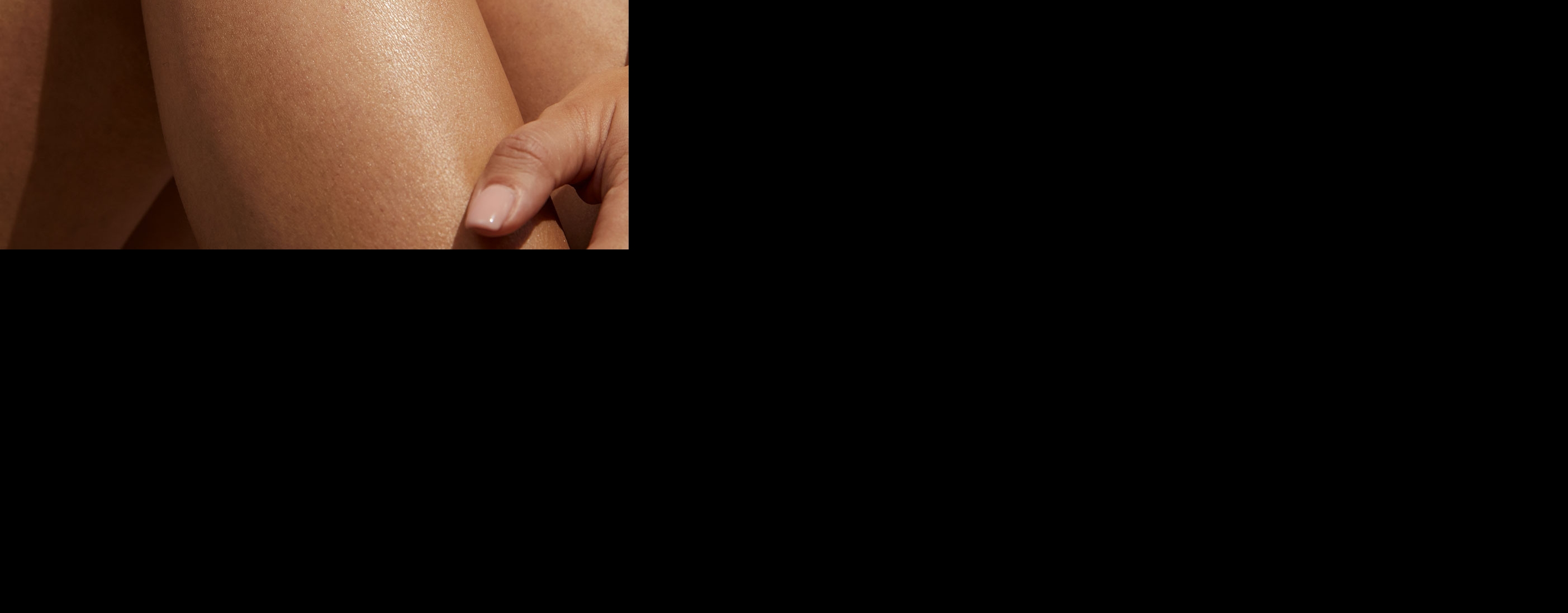 Rothaarige Frau mit einer Nivea Q10 Gesichtscreme