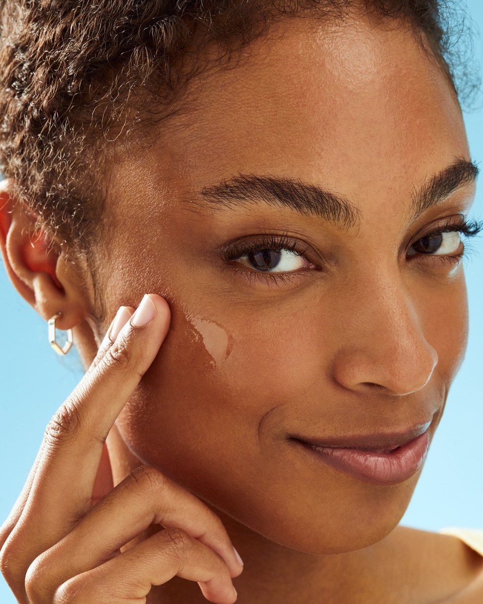 Women applying face cream