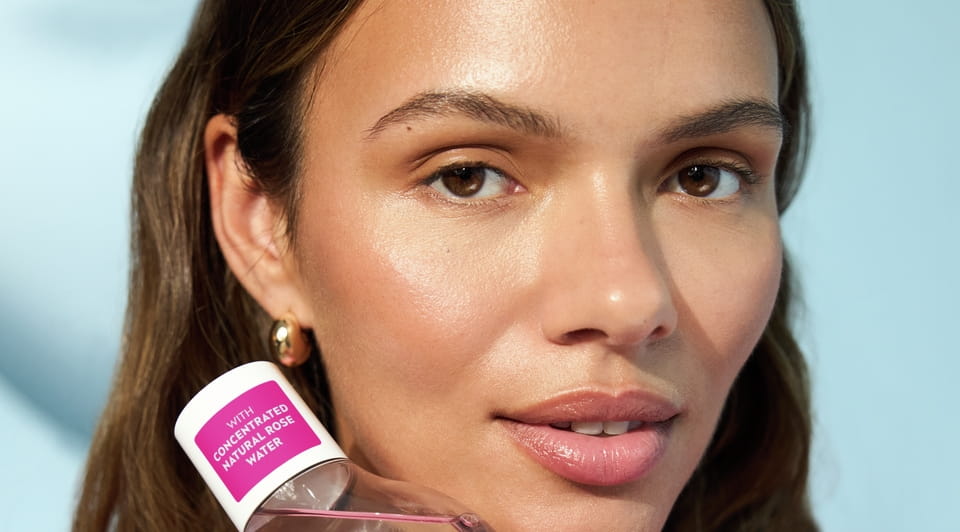 Young woman using Nivea Micellar Water Rose Care