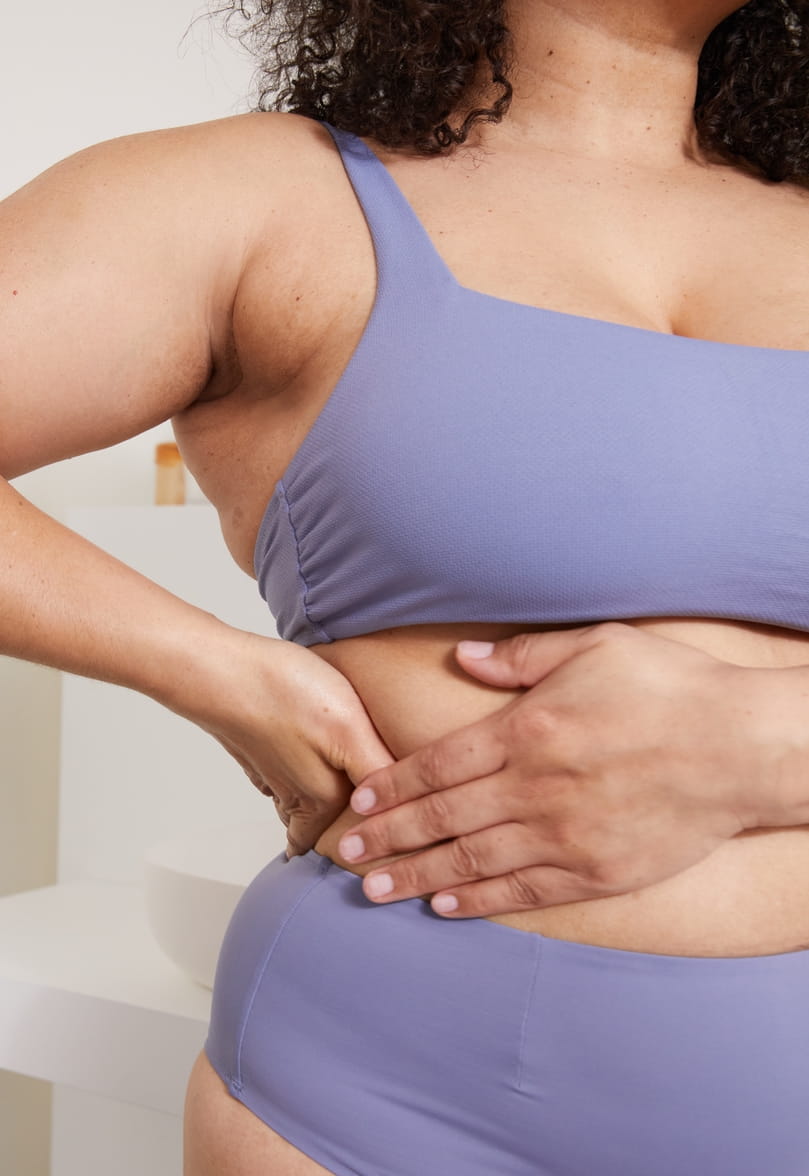 woman using a Nivea deodorant