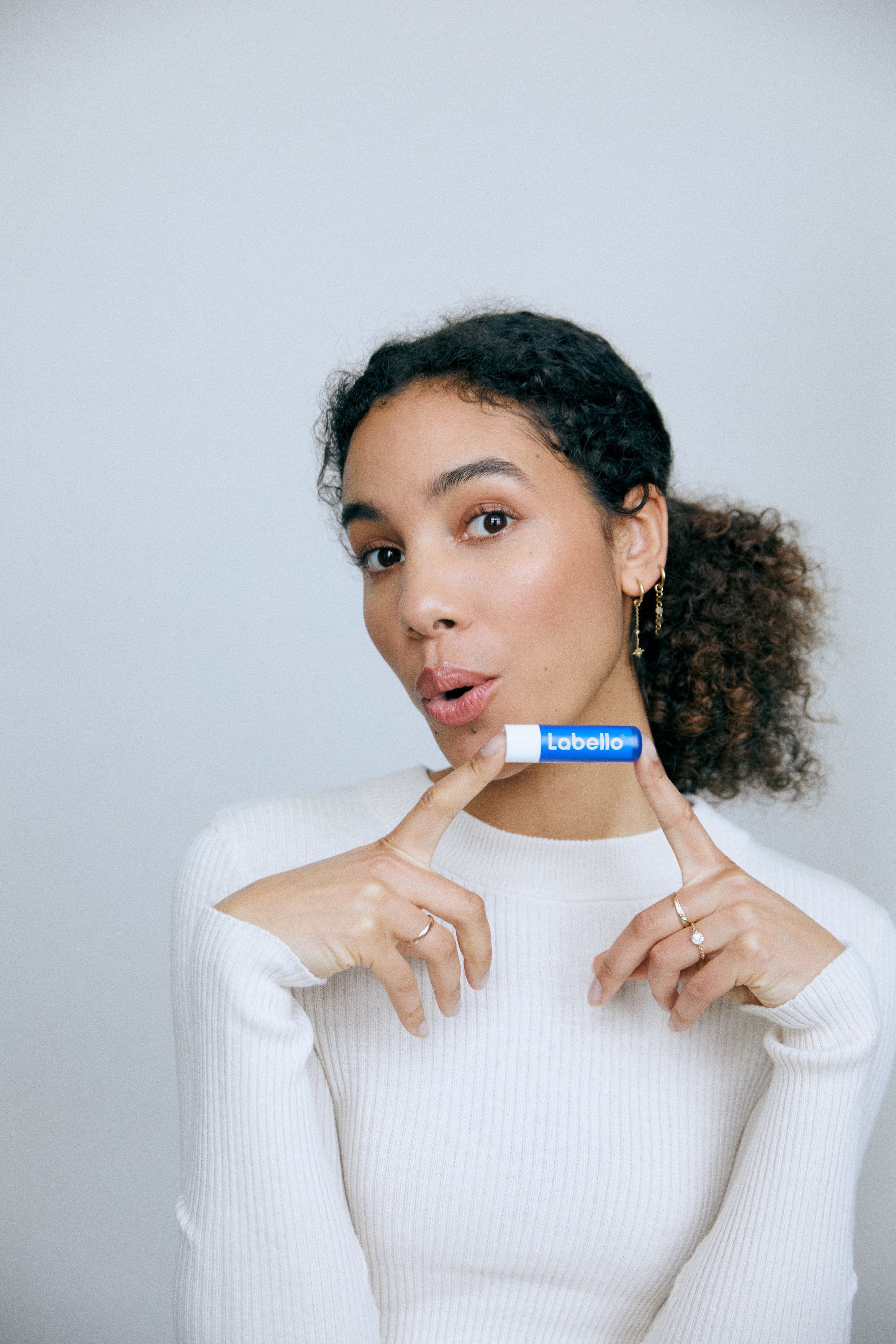 mulher com Labello Original