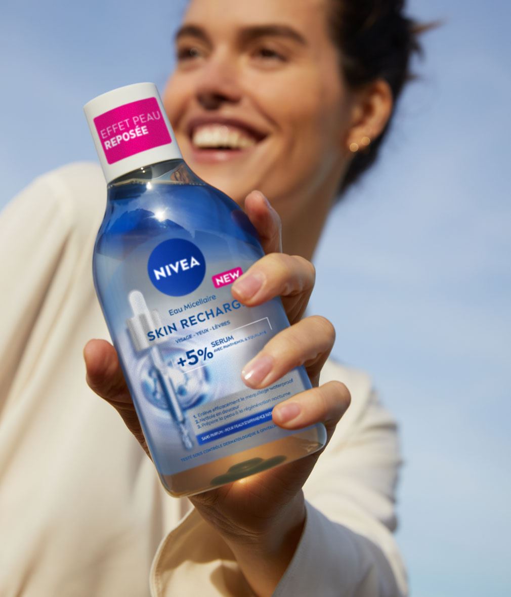 woman holding micellar water serum