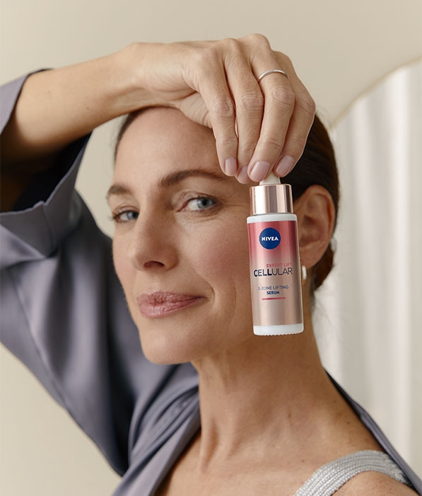 Woman using Nivea serum