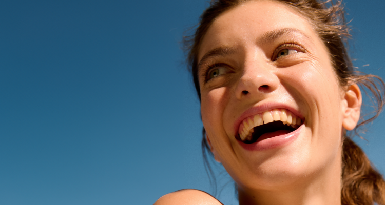 woman smiling with clear skin