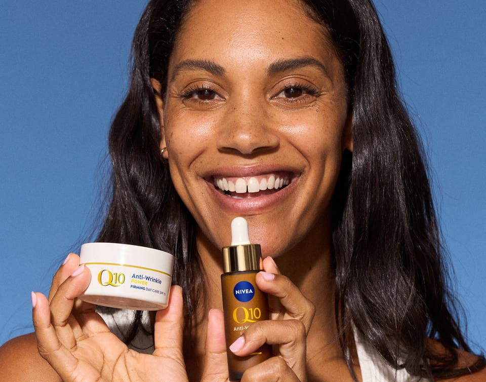 Woman using Nivea Q10 products