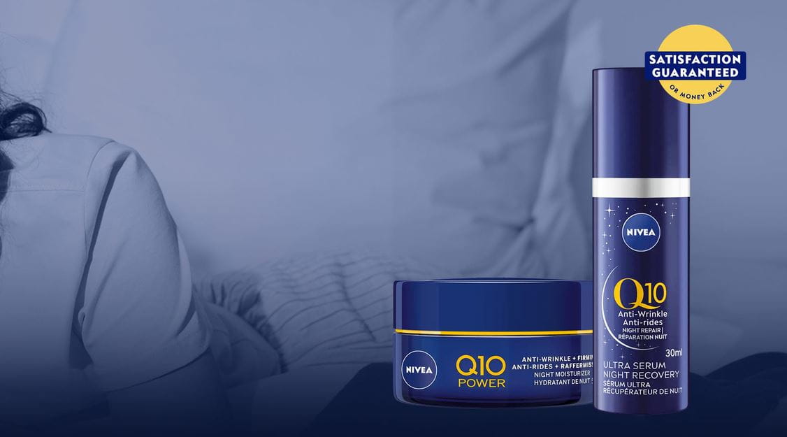 Two NIVEA Q10 products against a background that shows a person laying down while smiling off into the distance.
