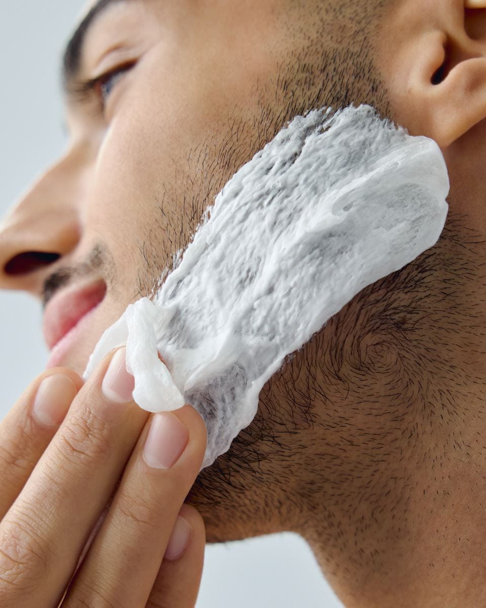 man using  NIVEA MEN Sensitive 0% Alcohol Post Shave Balm