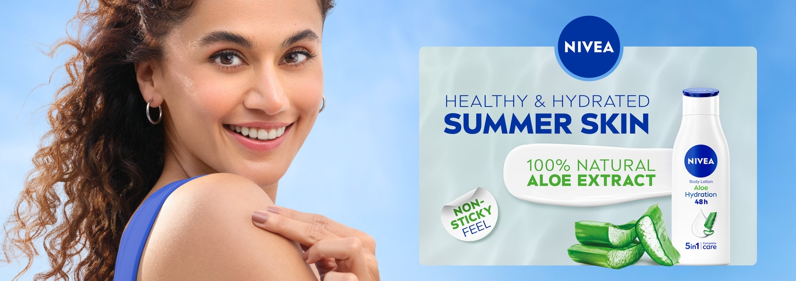 Smiling woman in blue shirt