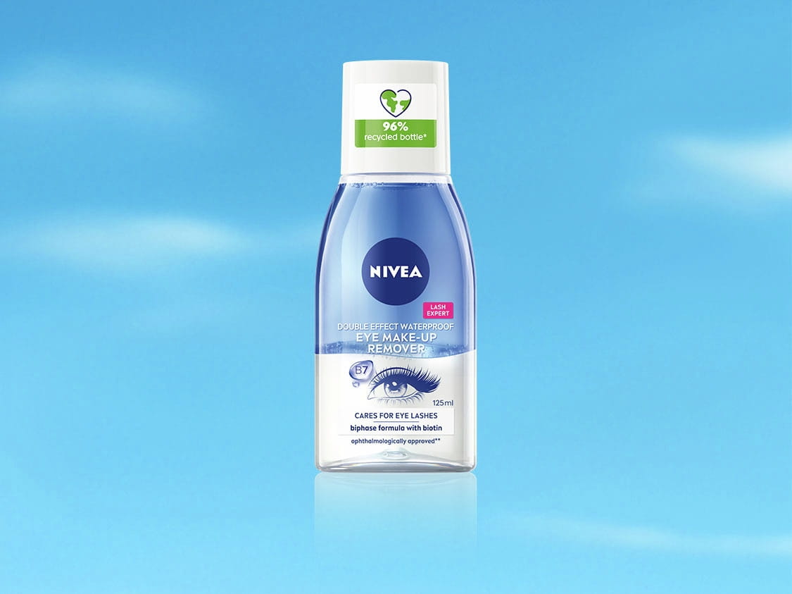 NIVEA Double Effect Waterproof Eye Make-Up Remover against a sky blue background.