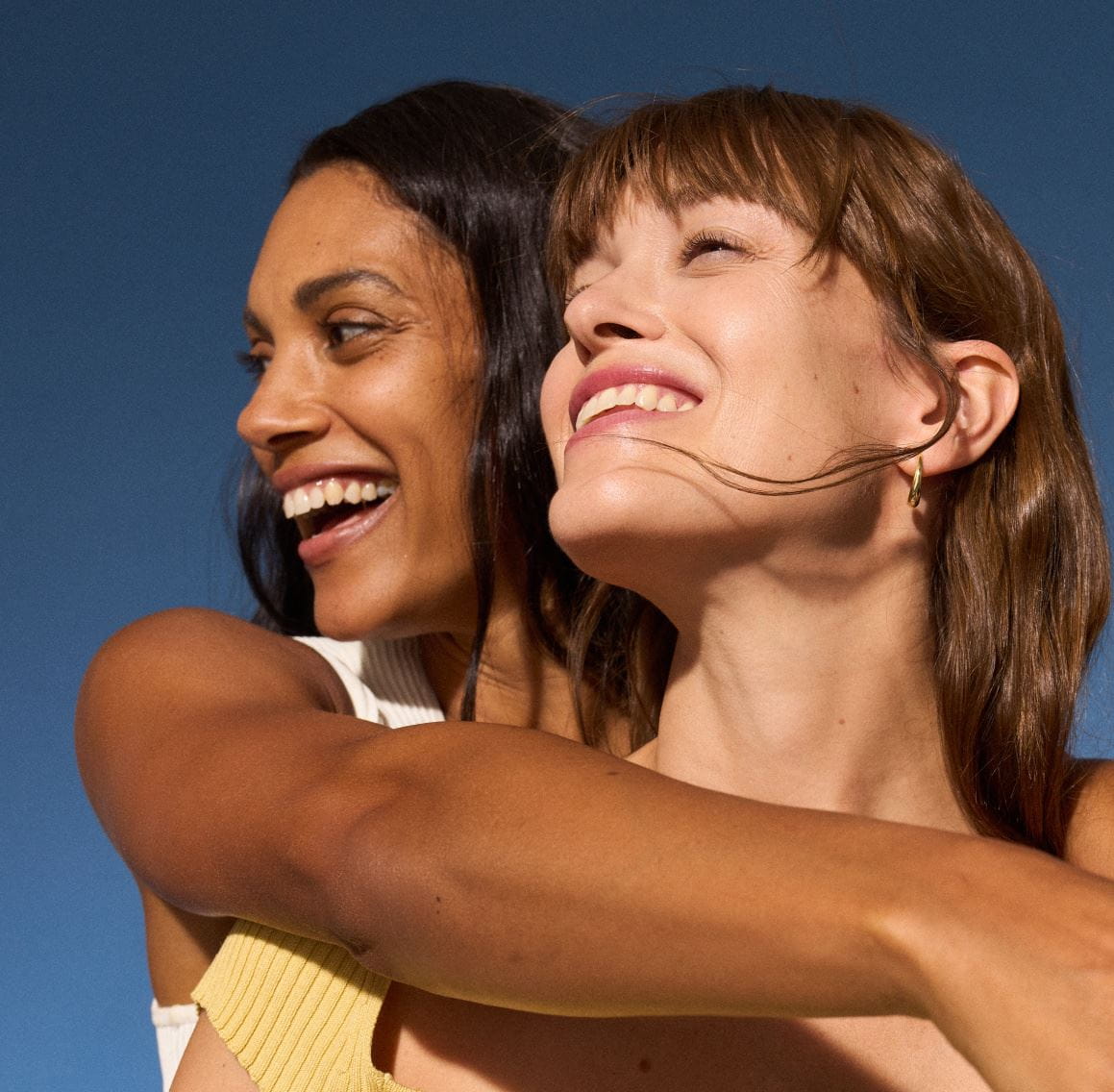 woman applying Nivea face cream