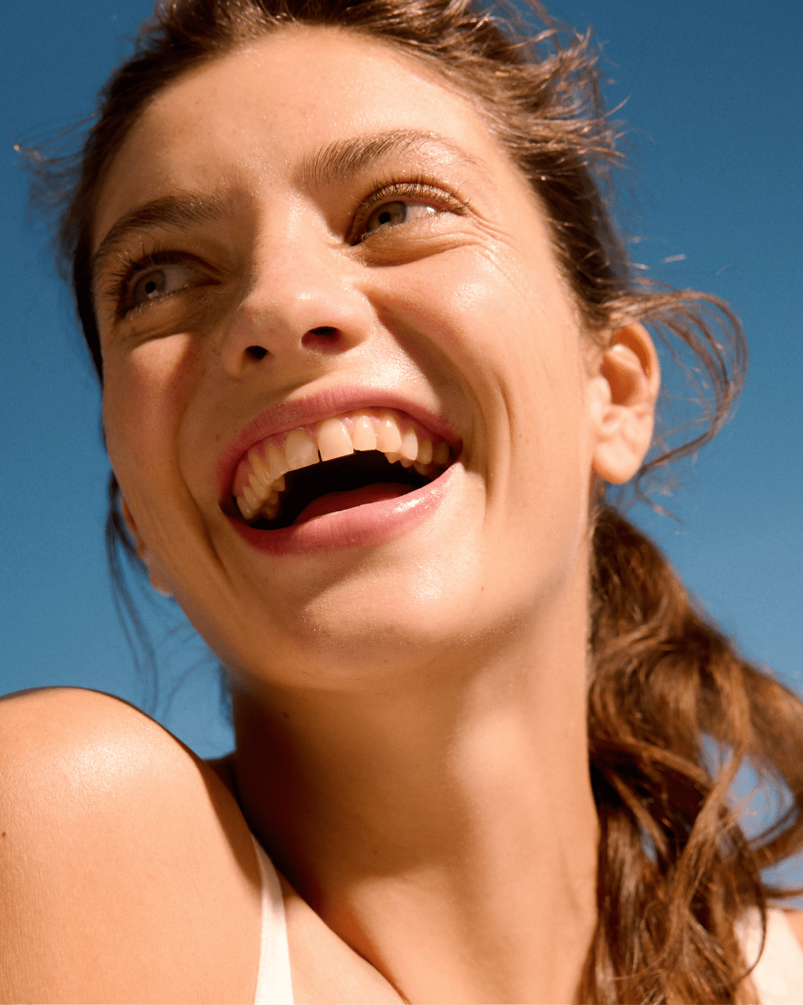 woman using face serum