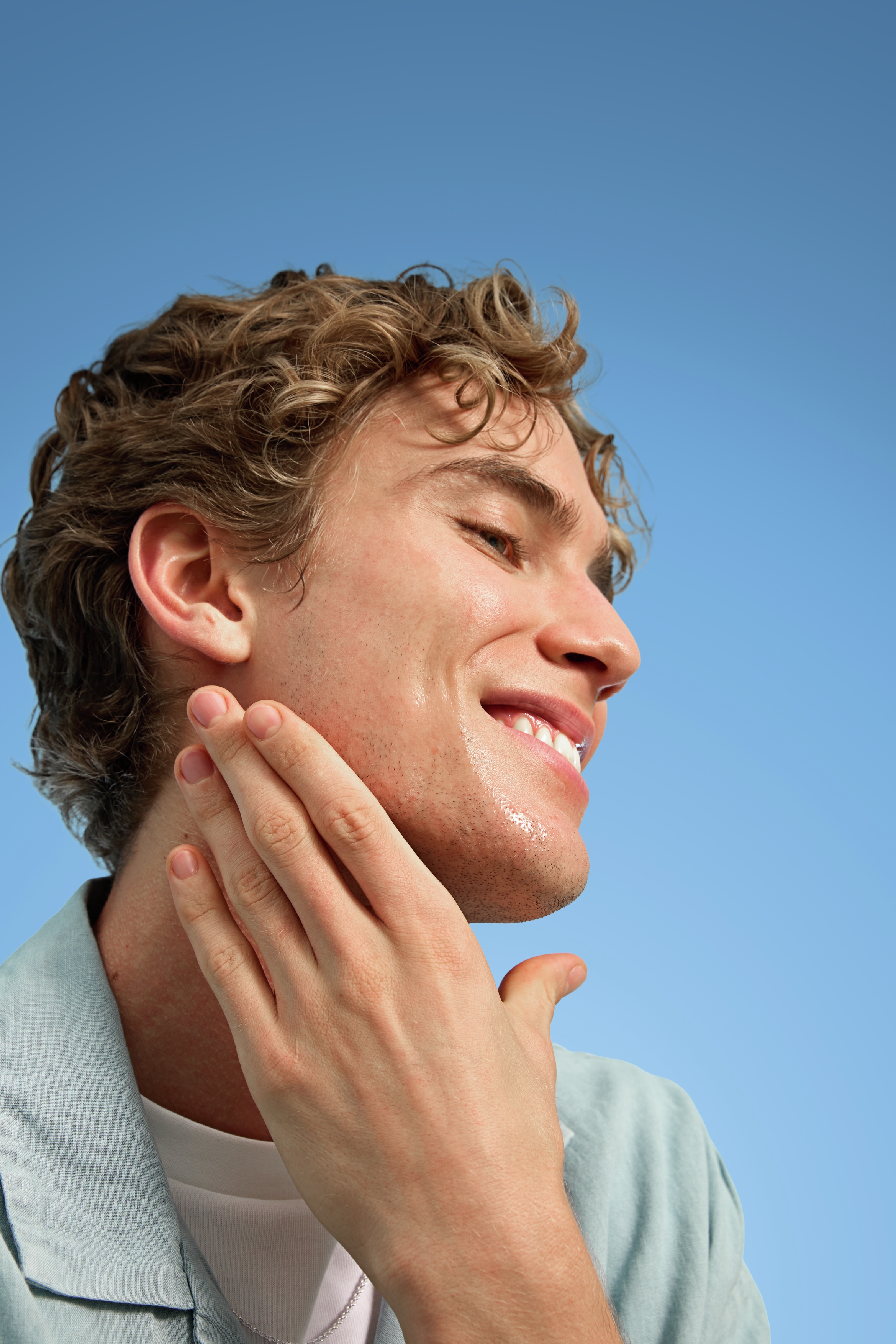 A man applying Moisturizing day cream on his face