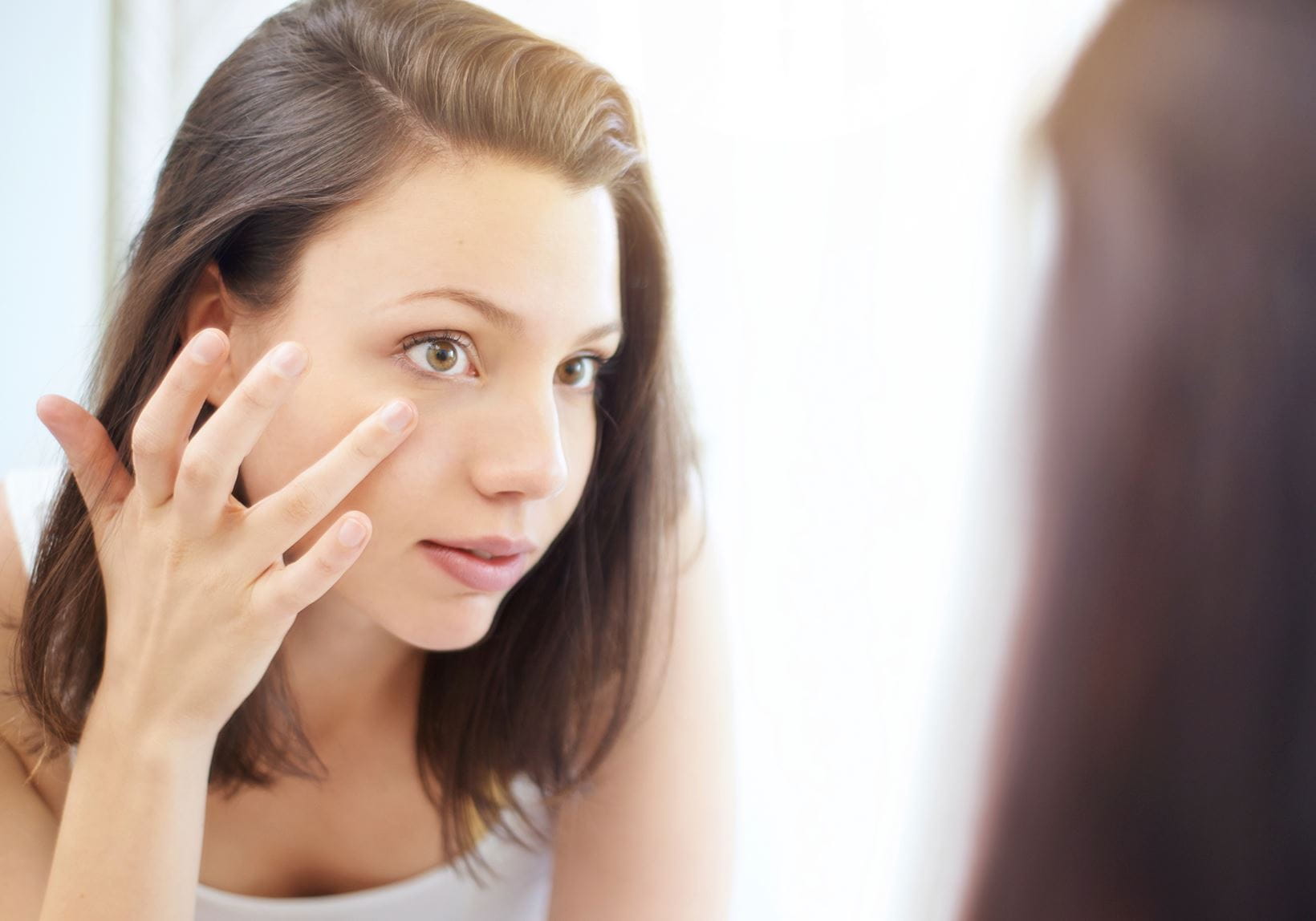 woman using bakuchiol in skincare