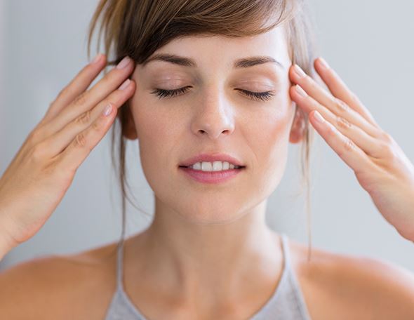 woman with her eyes closed and nice skin