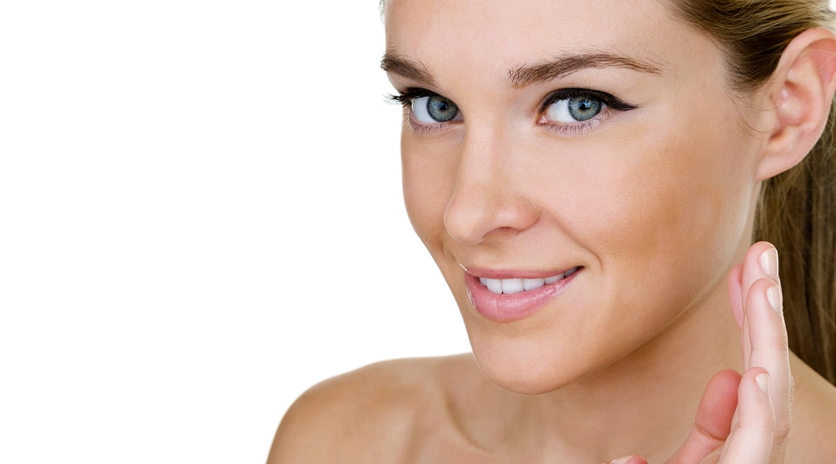 beautiful lady showing how to apply face mask