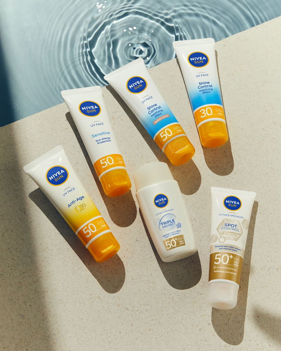 The picture displays a mother and child representing two different skin types for sun lotion to use