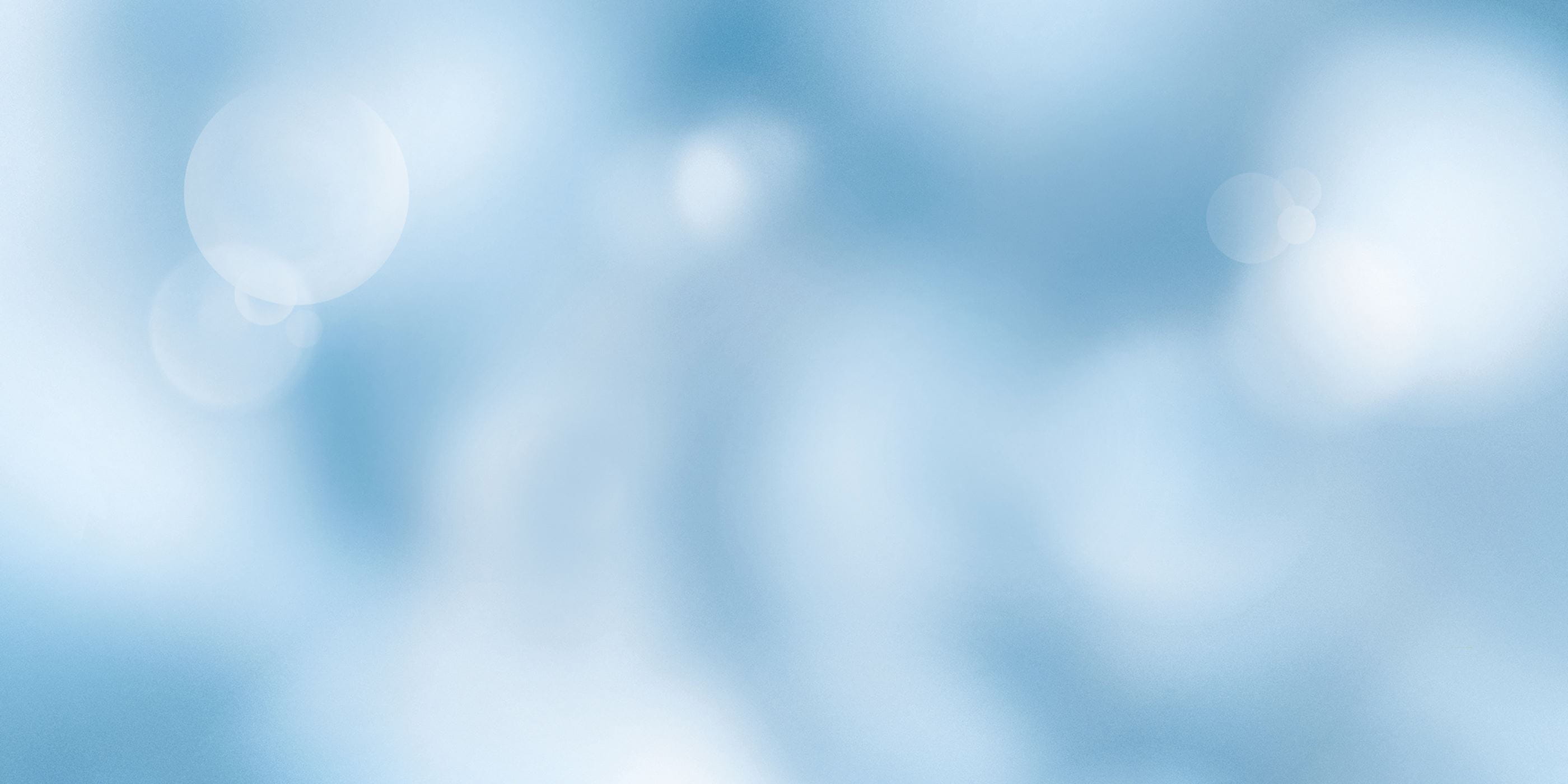 Weiß-blauer unscharfer Hintergrund