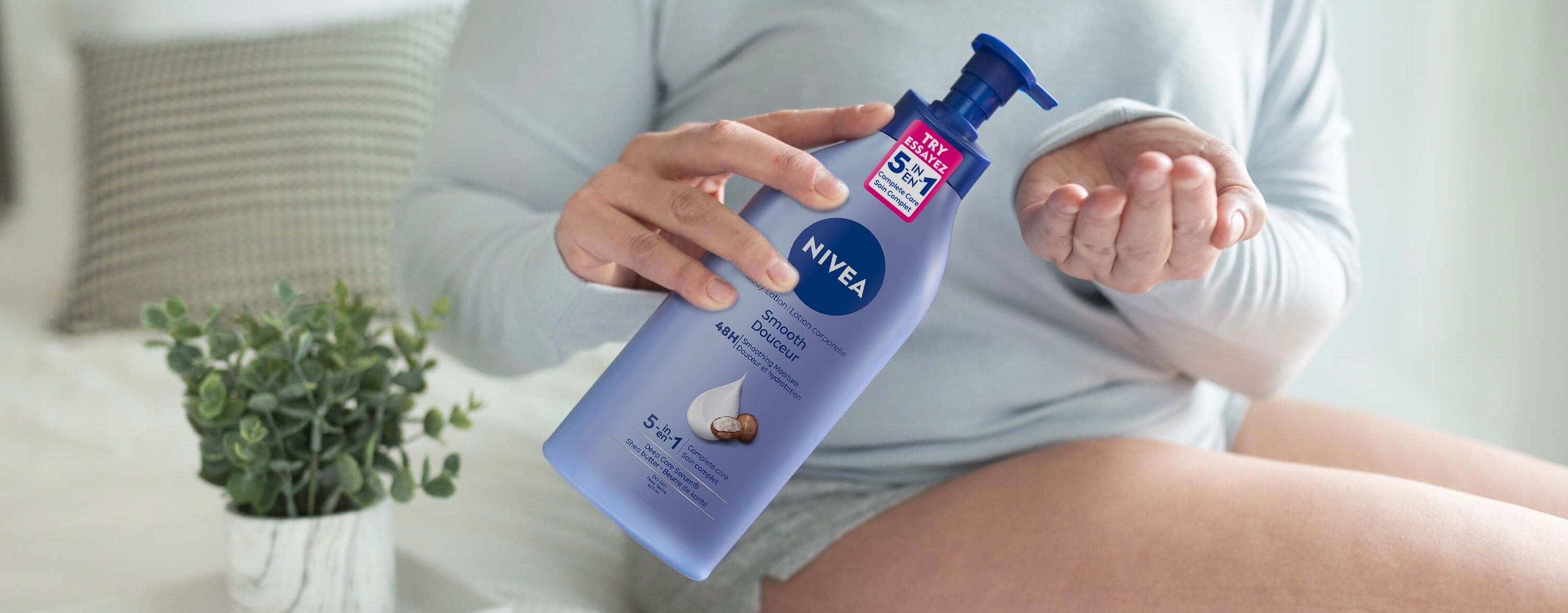 Woman using Nivea lotion