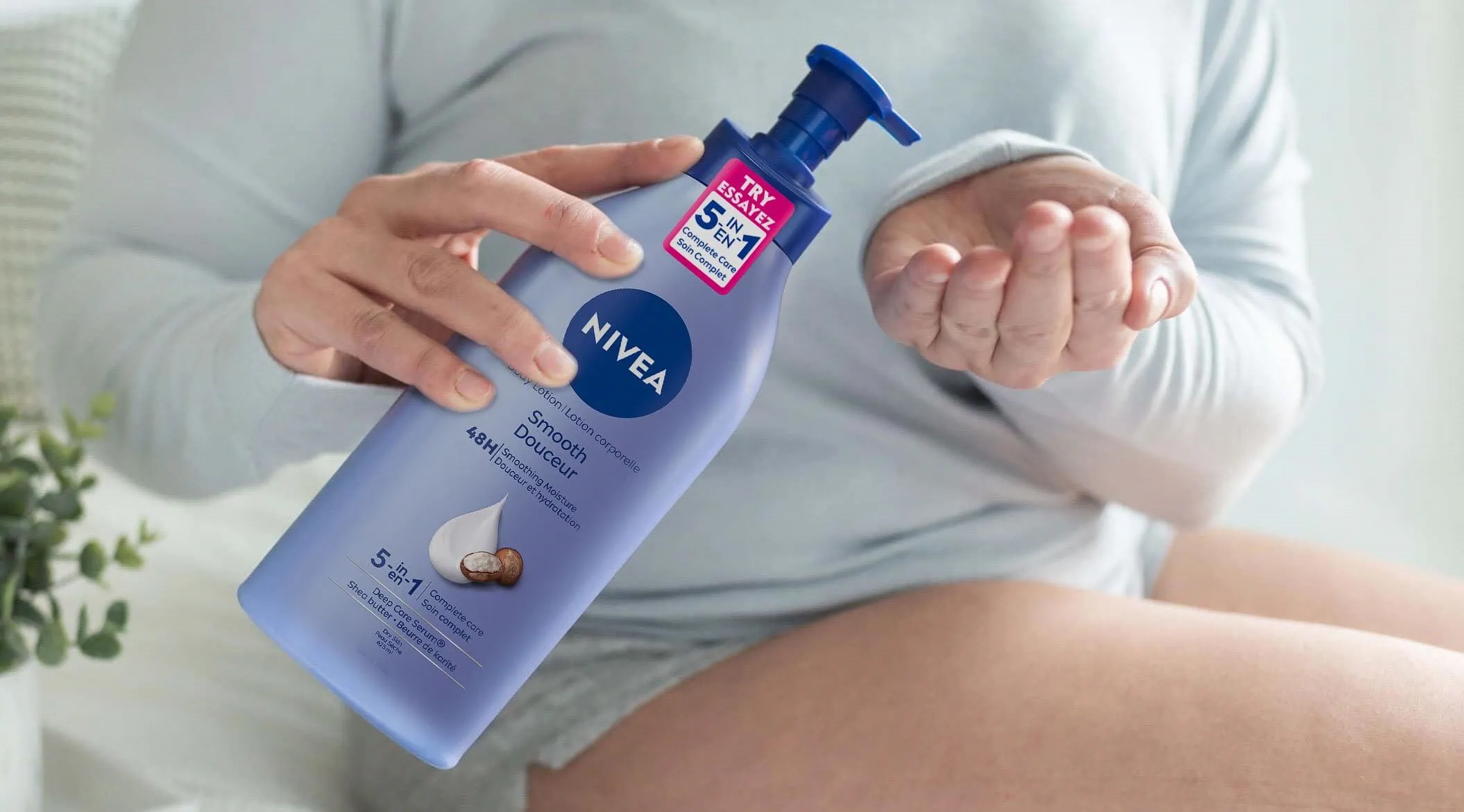 Woman using Nivea lotion