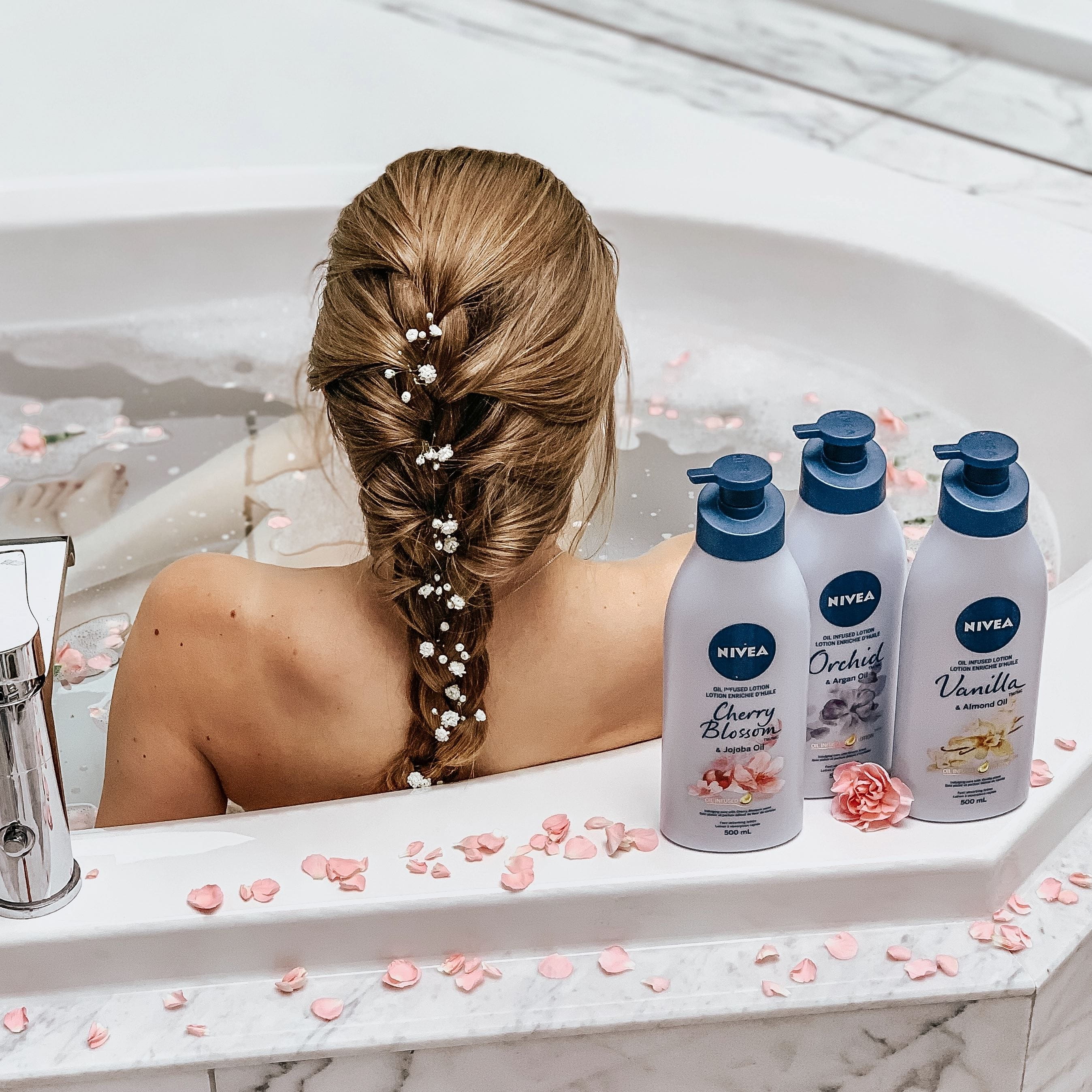 Emma using NIVEA Oil Infused