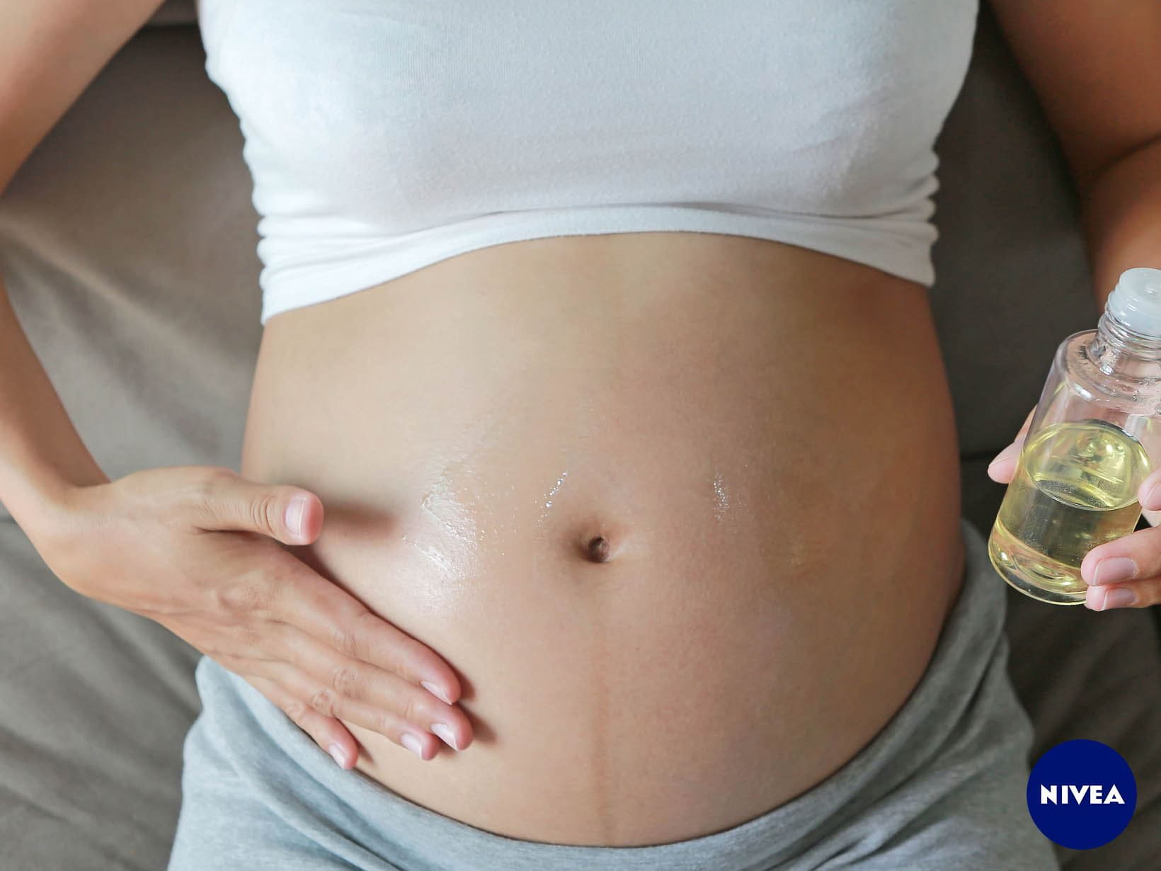 Balsam für den Babybauch: Hautpflege mit Öl