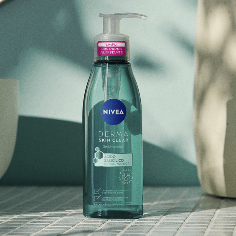 Nivea Skin Clear Wash Gel sitting on a tile bathroom counter next to a sink.