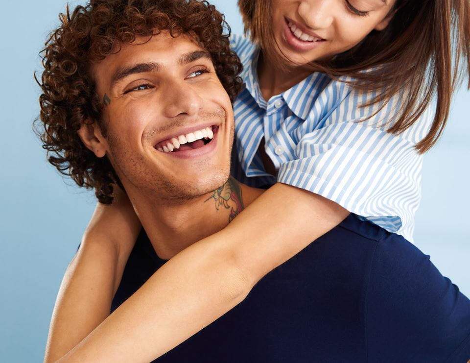 woman smiling darawing a smiley face