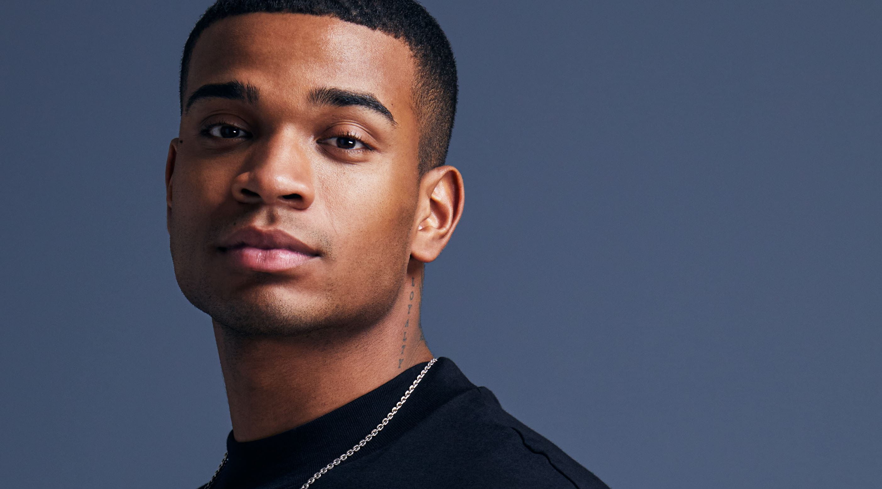 young man in black t-shirt