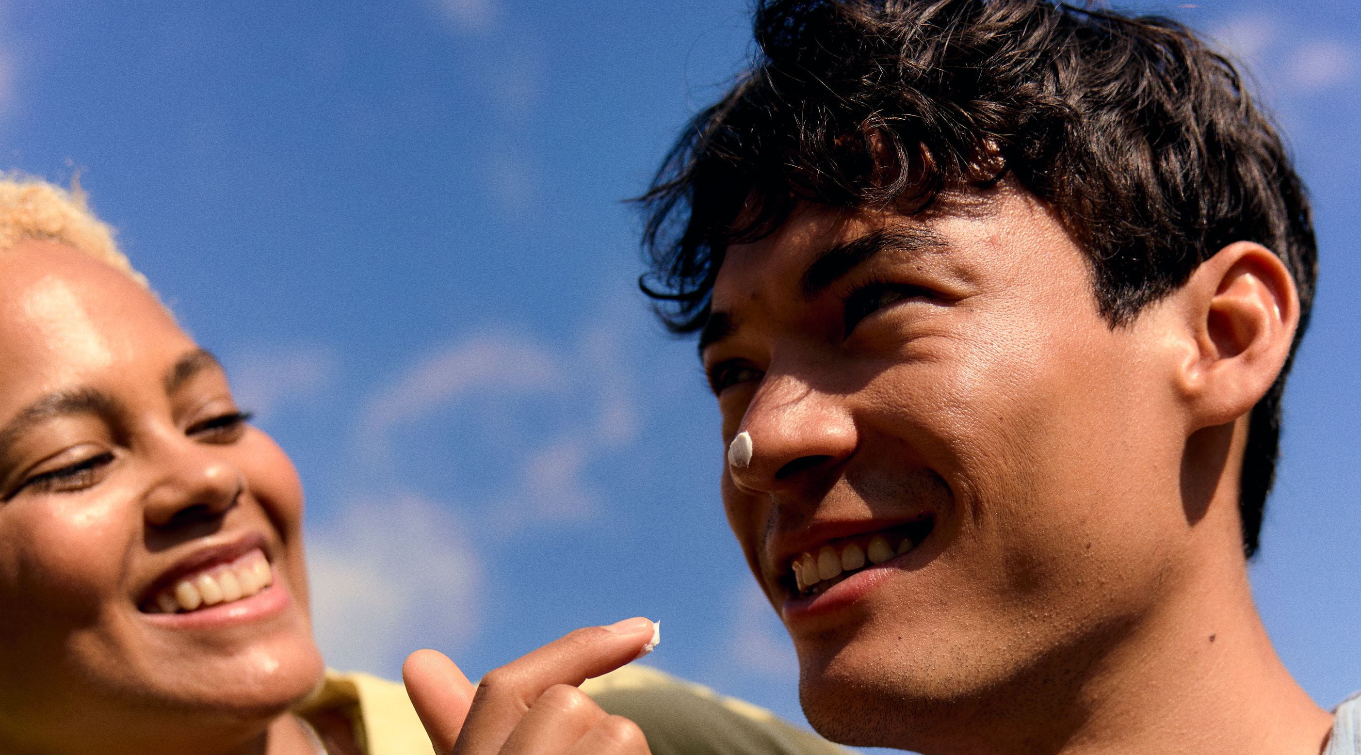 two young people smiling