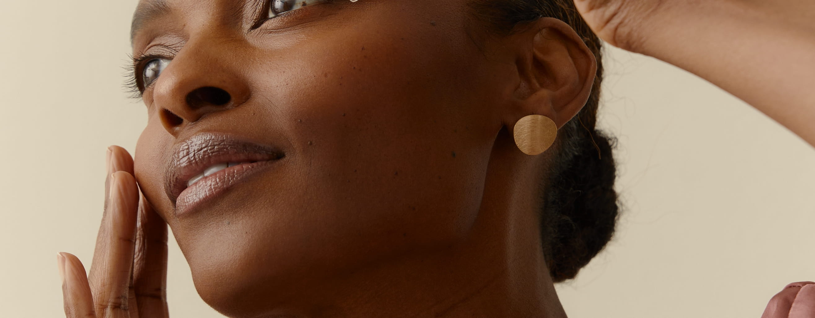 woman applying Nivea Cellular serum